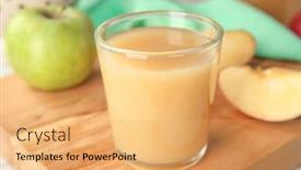  Presentation with juice - PPT theme having glass of delicious apple juice on wooden board closeup background and a yellow colored foreground