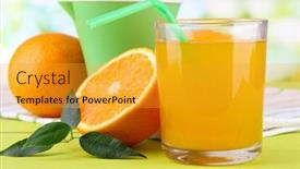  Presentation with press - Colorful presentation enhanced with glass of juice citrus press and ripe orange on green wooden table backdrop and a gold colored foreground