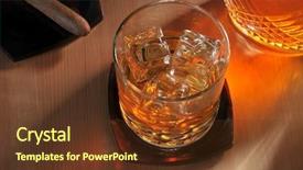  Presentation with cigar - Audience pleasing presentation theme consisting of glass of whiskey cigar and decanter with strong warm sidelight shot from a high angle on a wood table backdrop and a tawny brown colored foreground
