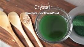  Presentation with spirulina - Cool new slides with glass with spirulina drink on wooden board backdrop and a tawny brown colored foreground