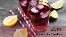  Presentation with soda - Theme having glasses of red soda water and sliced lemon on wooden table background and a tawny brown colored foreground
