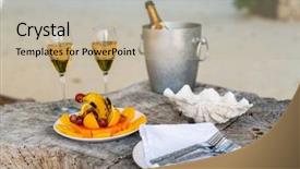  Presentation with two glasses of champagne - PPT theme having glasses with champagne and fruit background and a mint green colored foreground
