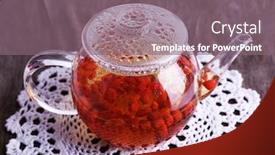  Presentation with glass teapot - Beautiful presentation theme featuring goji berries drink in glass teapot on lace napkin on wooden background backdrop and a gray colored foreground