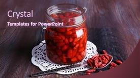  Presentation with goji - PPT theme with goji berries in glass bottle on lace doily with silver spoon on rustic wooden table background background and a tawny brown colored foreground