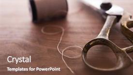  Presentation with thread - Presentation design with gold scissors and spool background and a tawny brown colored foreground