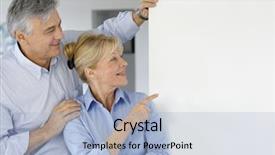  Presentation with airport boarding board - Theme having golden sixties - senior couple pointing at message background and a light blue colored foreground