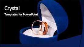  Presentation with golden wedding - PPT theme having golden wedding rings in blue background and a black colored foreground