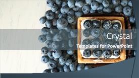  Presentation with blueberry - Audience pleasing theme consisting of gourmet fresh blueberry tart on table backdrop and a ocean colored foreground