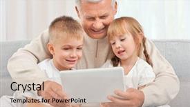  Presentation with grandfather - PPT layouts enhanced with grandfather with grandchildren using tablet on couch background and a soft green colored foreground