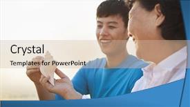  Presentation with seashell - Beautiful PPT theme featuring grandmother and grandson looking at seashell backdrop and a soft green colored foreground