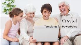  Presentation with grandparents - Presentation having grandparents and grandchildren using laptop on the sofa and laughing background and a soft green colored foreground