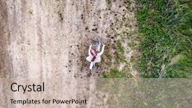  Presentation with country of tibet - Presentation having grass path - little girl rides bicycle background and a soft green colored foreground