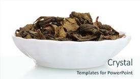  Presentation with tea leaves - Amazing PPT theme having green dry tea leaves in plate isolated on white backdrop and a sky blue colored foreground