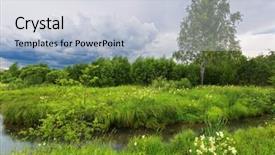  Presentation with gloomy - Colorful theme enhanced with green field with river under gloomy sky backdrop and a lemonade colored foreground