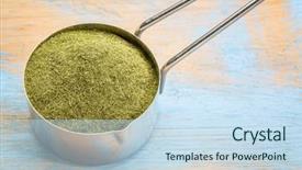  Presentation with supplement - Presentation design consisting of green freeze-dried organic wheat grass powder nutritional supplement on a metal measuring scoop against painted grunge wood background and a sky blue colored foreground