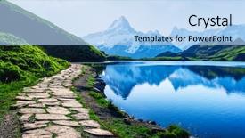  Presentation with green lake - PPT theme enhanced with green grass and snowy peak background and a light blue colored foreground