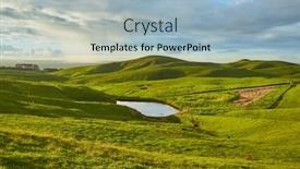  Presentation with green hills - Amazing PPT theme having green hills with fresh grass on motutapu island backdrop and a light blue colored foreground