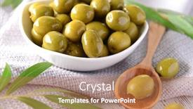  Presentation with tea leaves fresh green leaf - Presentation with green-olives-in-bowl background and a coral colored foreground