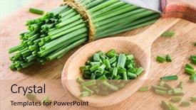  Presentation with onion - Theme with green onion on the wooden background and a coral colored foreground