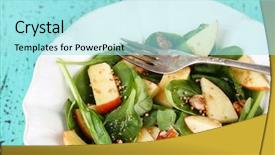  Presentation with green color - Theme consisting of green salad with spinach apples walnuts and cheese on color wooden background background and a arctic colored foreground