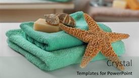  Presentation with shells - Slide deck featuring green towels with starfish shells and soap on bathroom table background and a seafoam green colored foreground