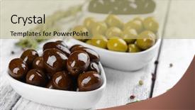  Presentation with different - Presentation featuring green white ovale - different marinated olives on table background and a mint green colored foreground