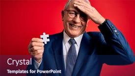  Presentation with hand holding puzzle piece - Presentation theme consisting of grey-haired-senior-business-man background and a navy blue colored foreground