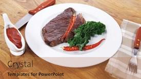  Presentation with hot sauce - Colorful presentation design enhanced with grilled beef steak fillet meat with red hot pepper and raw kale leaf with ketchup sauce served on white plate over wood table backdrop and a coral colored foreground