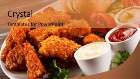  Presentation with grilled chicken - Beautiful presentation featuring grilled chicken nuggets and vegetables backdrop and a gold colored foreground