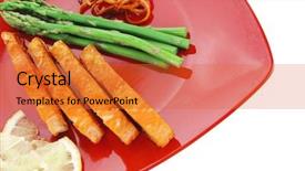  Presentation with orange peel isolated - Audience pleasing theme consisting of grilled salmon slices with asparagus lemon and fried orange peel on red plate isolated over white background backdrop and a red colored foreground