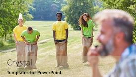  Presentation with summer event - Slides with group-during-sack-race-competition background and a soft green colored foreground