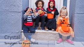  Presentation with costume - Presentation theme featuring group-of-kids-wearing-halloween background and a light blue colored foreground