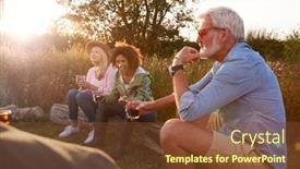  Presentation with campsite - Beautiful slide set featuring group of mature friends sitting around fire as they drink wine at outdoor campsite backdrop and a tawny brown colored foreground
