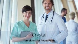  Presentation with team group - Audience pleasing PPT theme consisting of group of medical staff at hospital doctors team standing together backdrop and a light blue colored foreground