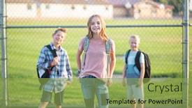  Presentation with elementary - Slide set featuring group of school kids smiling while standing together in an elementary school playground back to school photo background and a yellow colored foreground