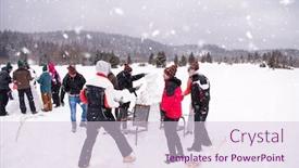  Presentation with business competition - PPT theme having group of young happy business people having a competition in making snowmen while enjoying snowy winter day with snowflakes around them during a team building in the mountain forest background and a lemonade colored foreground