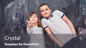  Presentation with childrens - PPT theme enhanced with group portrait of happy childrens boy and little girl standing in front of black chalkboard background and a dark gray colored foreground