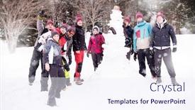  Presentation with snowflakes - Slide set consisting of group portrait of young happy business people after a competition posing with finished snowman while enjoying snowy winter day with snowflakes around them during a team building in the mountain forest background and a sky blue colored foreground