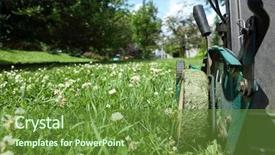  Presentation with clover - PPT theme featuring growth engine - lawnmower cutting long grass full background and a tawny brown colored foreground