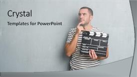  Presentation with grey - Audience pleasing presentation theme consisting of grunge wall holding movie clapboard backdrop and a light gray colored foreground