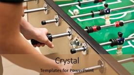  Presentation with soccer - Cool new PPT theme with guys are playing table soccer backdrop and a  colored foreground
