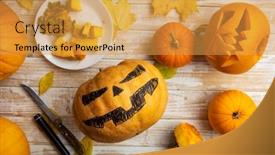  Presentation with lantern - Cool new presentation theme with halloween-carving-close-up backdrop and a gold colored foreground
