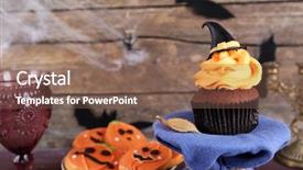  Presentation with cupcake - PPT theme enhanced with halloween cupcake and biscuits on table on wooden wall background background and a violet colored foreground