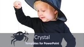  Presentation with spider - Slide deck enhanced with halloween dressed toddler girl in black little witch costume looking to small spider background and a tawny brown colored foreground