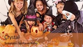  Presentation with halloween candy - PPT theme consisting of halloween party with children holding background and a red colored foreground