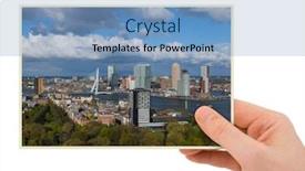  Presentation with cityscape - Audience pleasing presentation theme consisting of hand-and-rotterdam-cityscape-netherlands backdrop and a light blue colored foreground