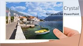  Presentation with village - Presentation having hand-and-village-perast-montenegro background and a light blue colored foreground