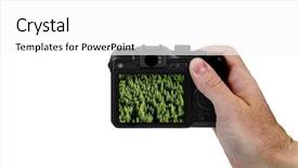  Presentation with green screen - Audience pleasing PPT layouts consisting of hand holding point and shoot camera isolated on white background with green foliage on screen backdrop and a white colored foreground