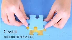  Presentation with hand holding puzzle piece - PPT layouts having hand holding puzzle piece close background and a arctic colored foreground