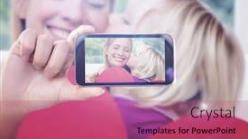  Presentation with daughter mother - Presentation design enhanced with hand holding smartphone showing against happy mother and daughter on the couch with heart card background and a coral colored foreground